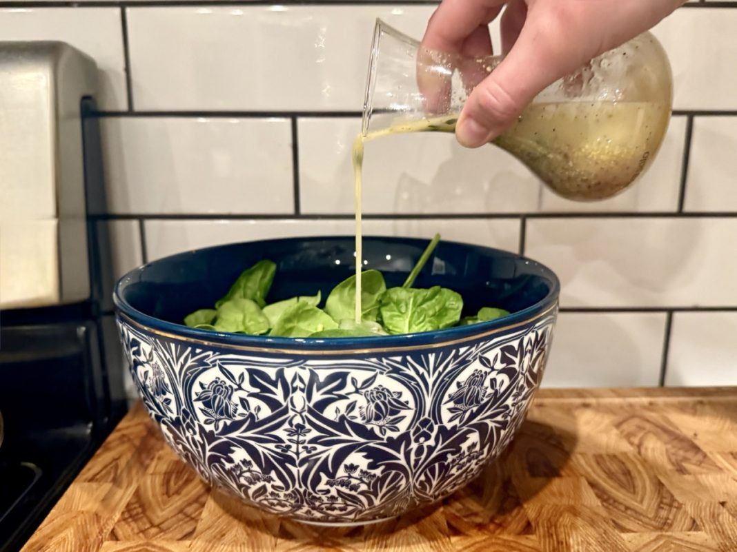 Eva solo dressing shaker pouring