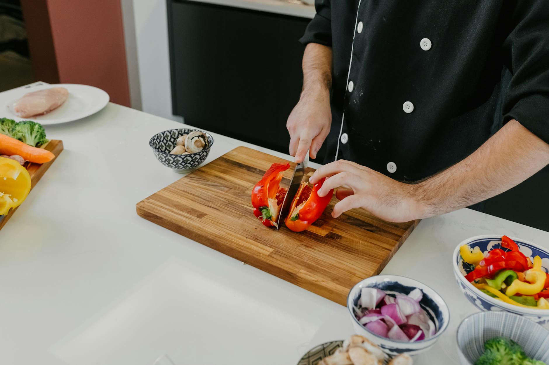 chef preparing fresh vegetables in kitchen