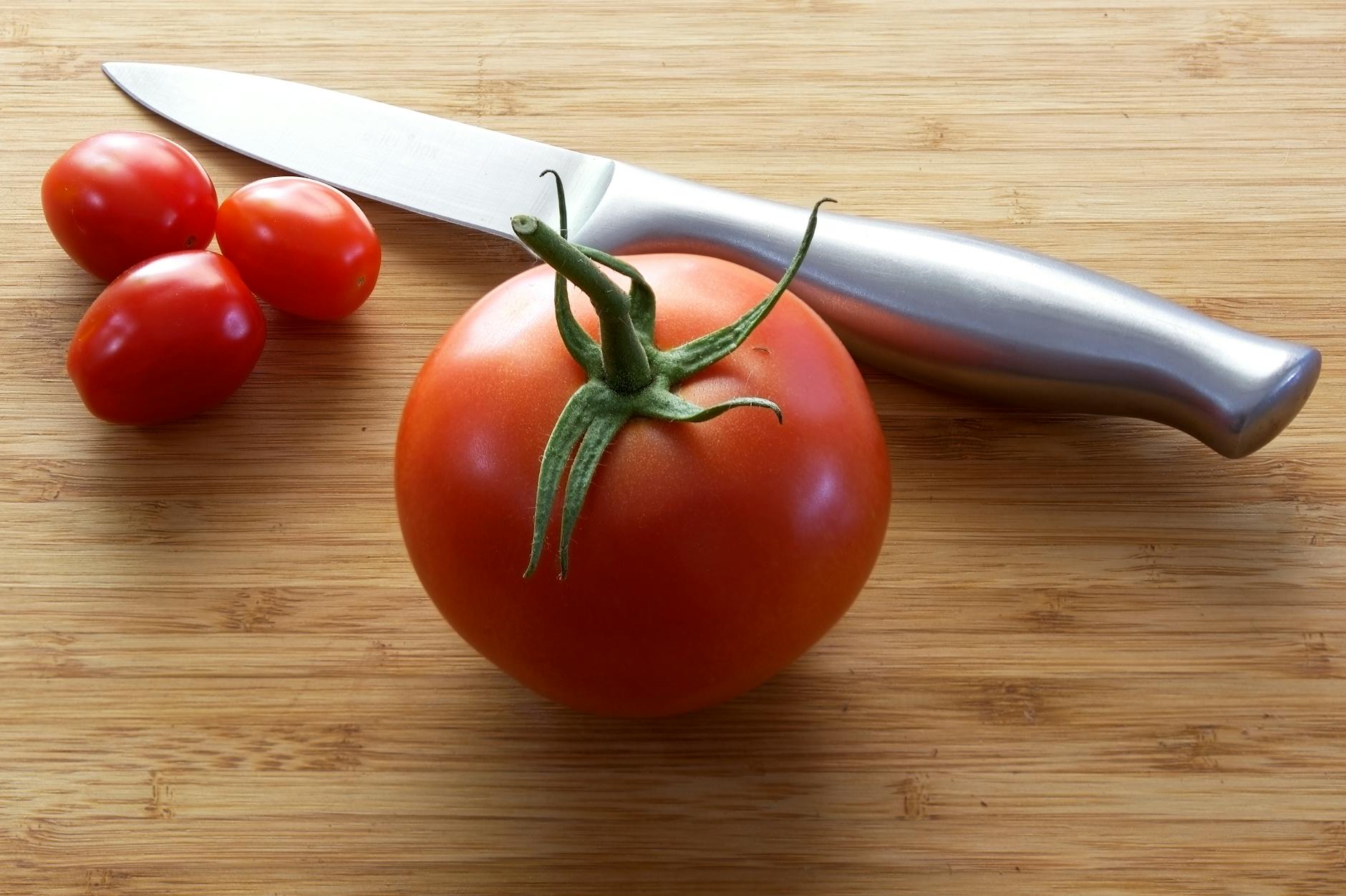 tomatoes near knife