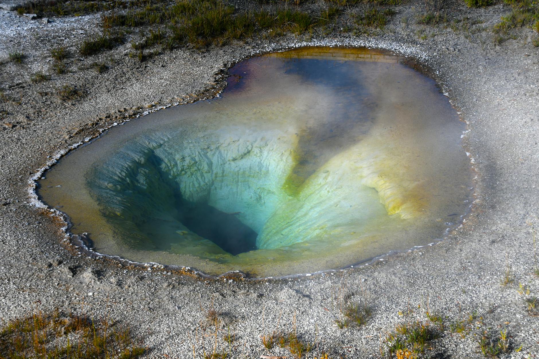 aerial shot of a hot spring in yellowstone national park in usa